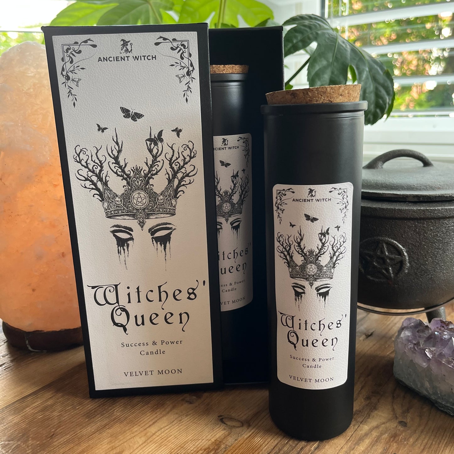 Ancient Witch Witches' Queen candle in a beautifully illustrated gift box, illustrated with a crown & moth representing courage, resilience and wisdom. Each Glass pillar candle has a cork lid. Includes a ritual spell card.