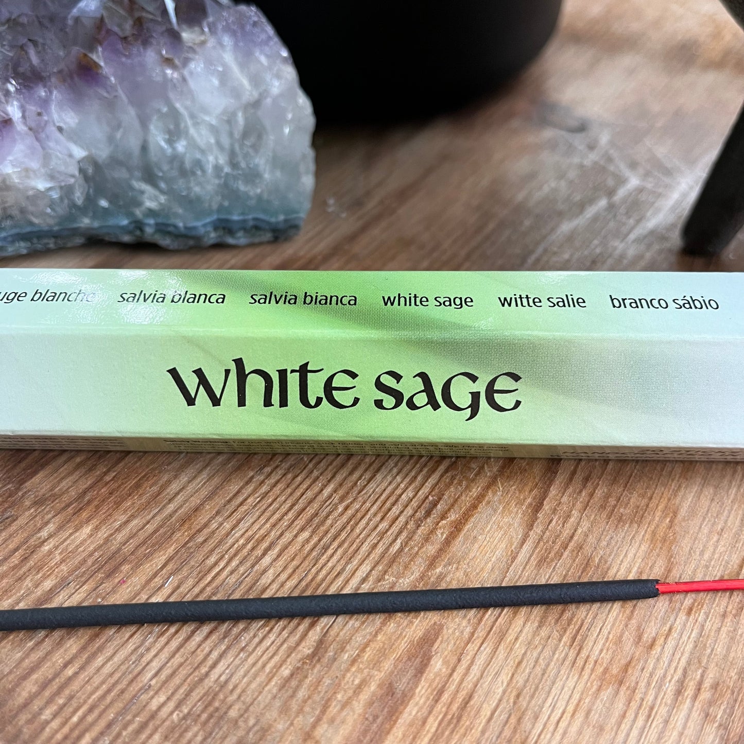 A package of White Sage incense with a green and white label.