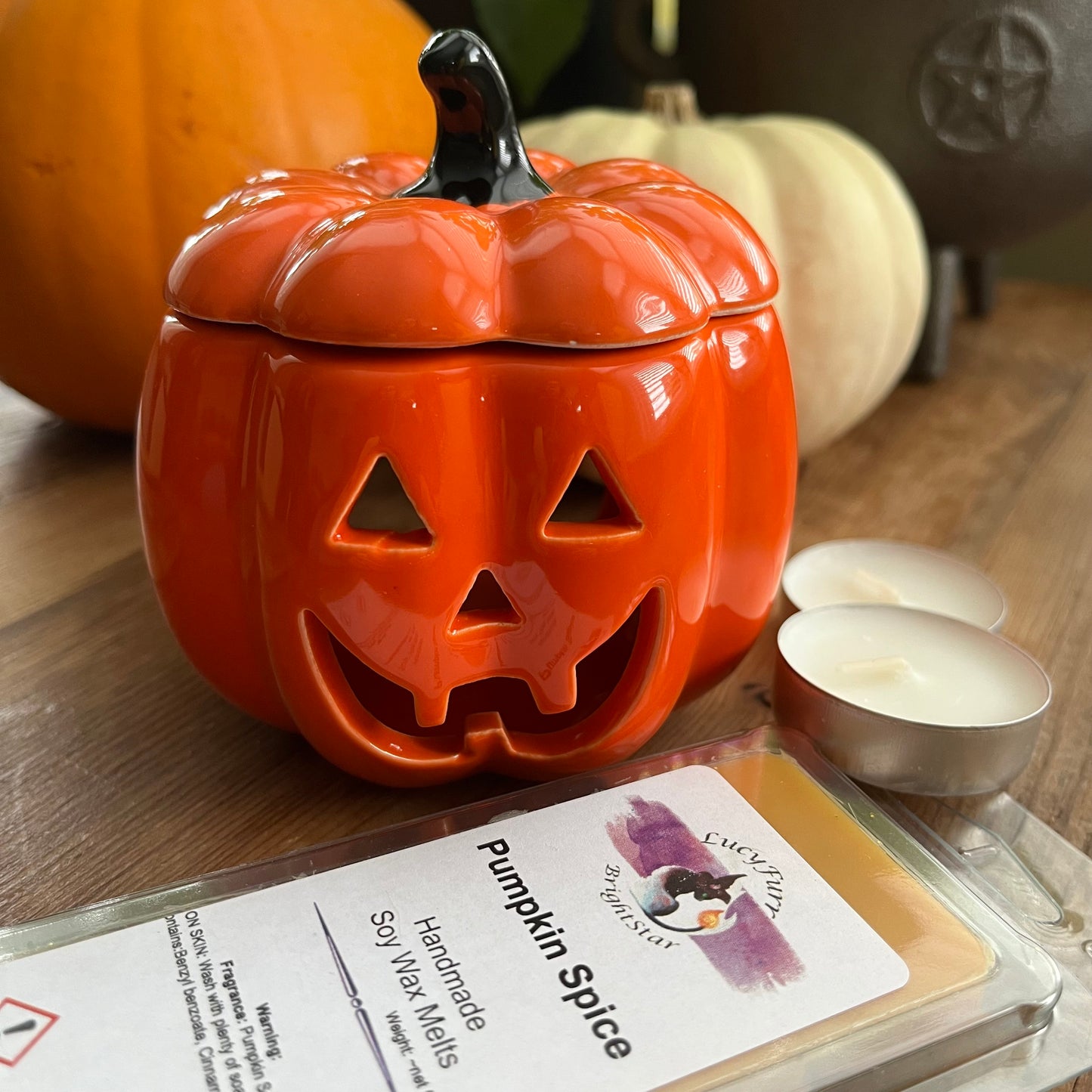 Pumpkin-shaped oil burner and pumpkin spice wax melt bar