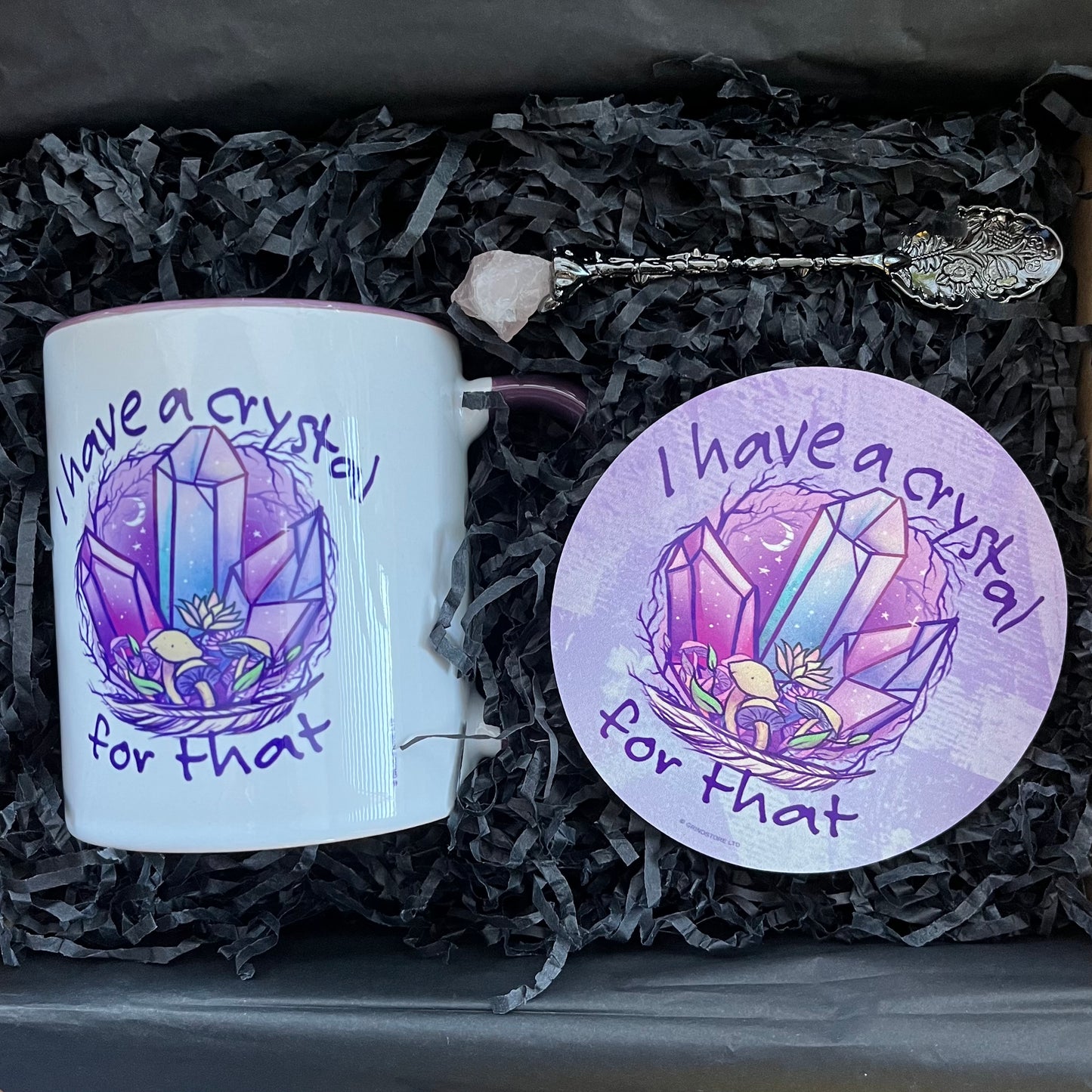 Mug and coaster set with crystal design and text 'I have a crystal for that' in a box.
