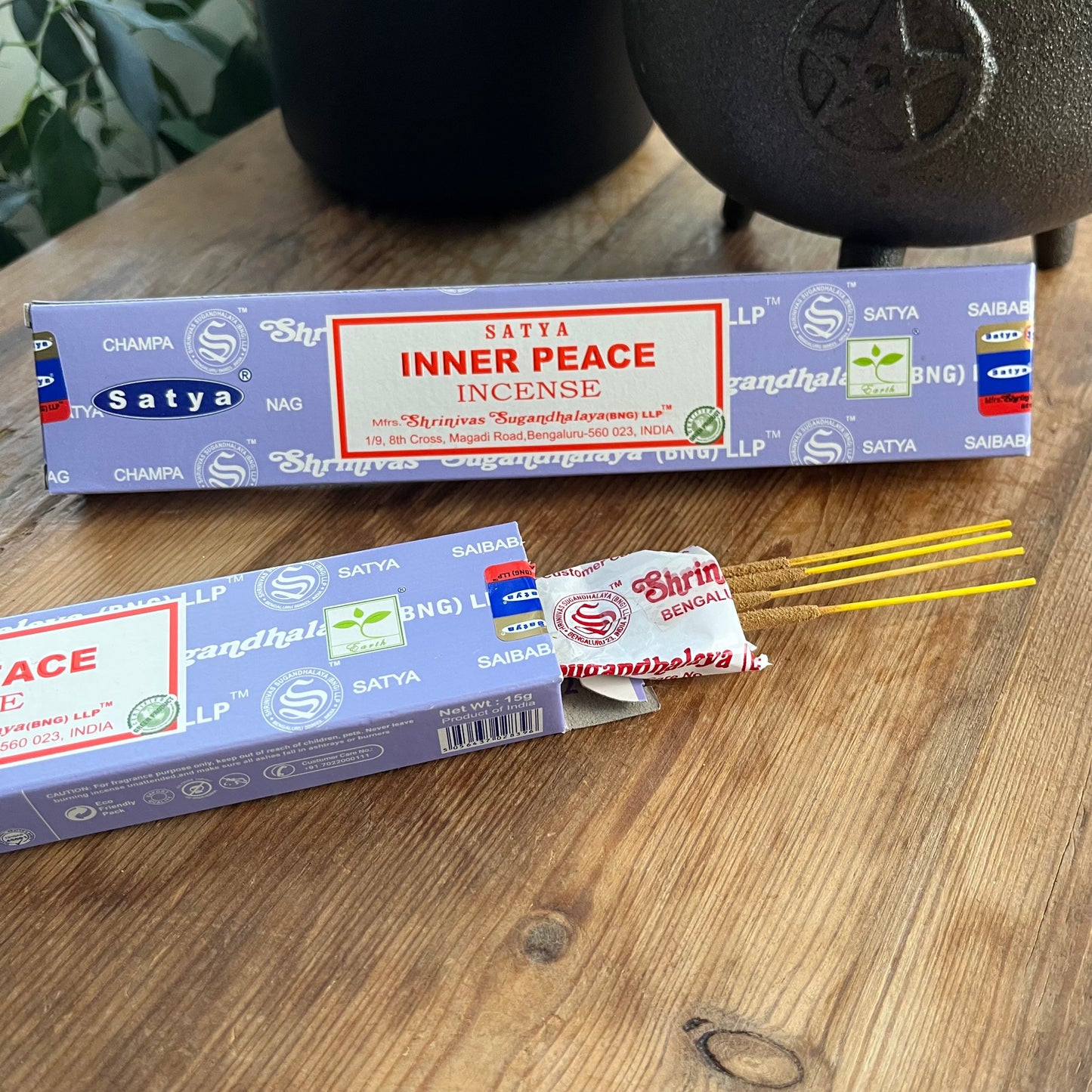 Box of Satya Inner Peace Incense on wooden background