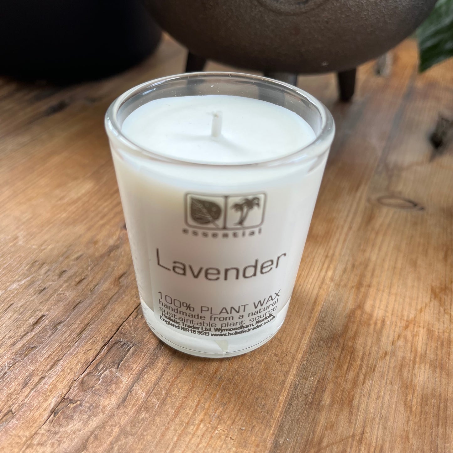 White votive candle fragranced with lavender essential oil