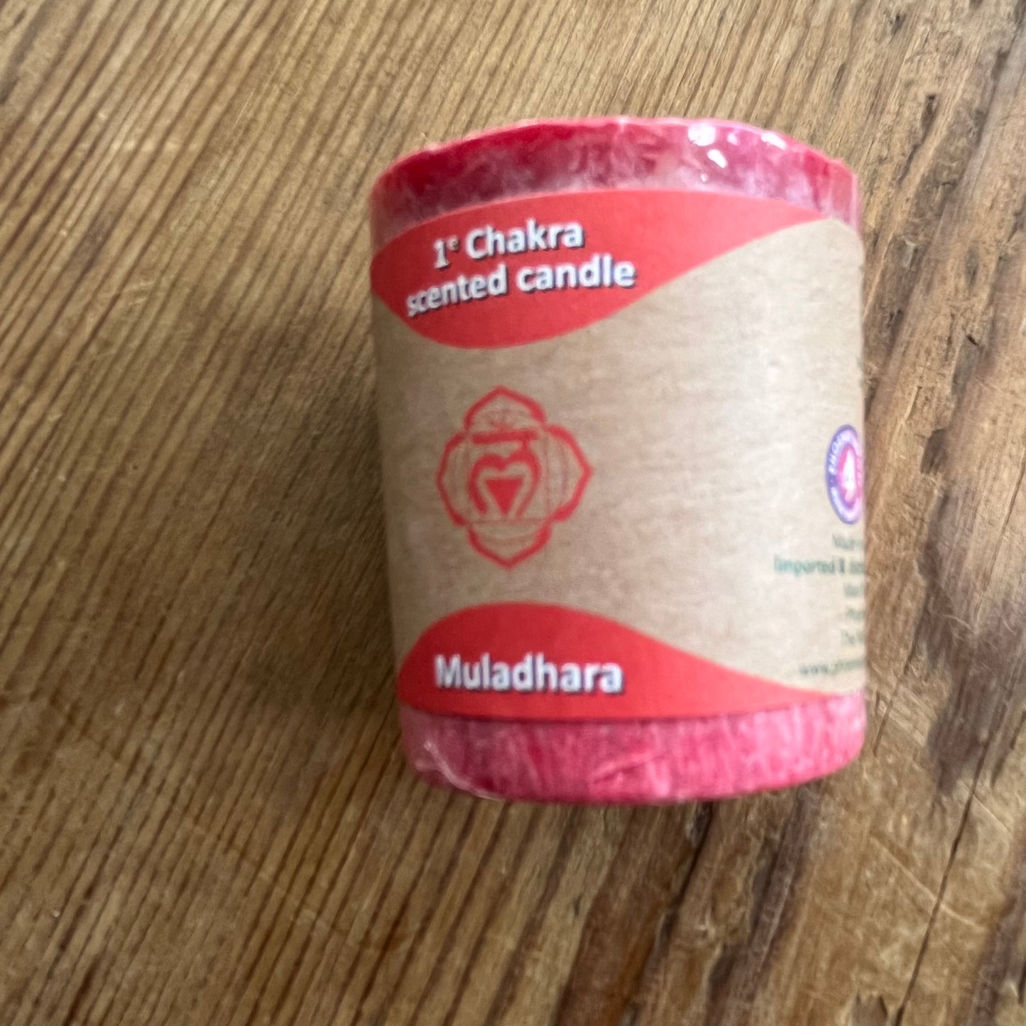 small red votive candle for root chakra