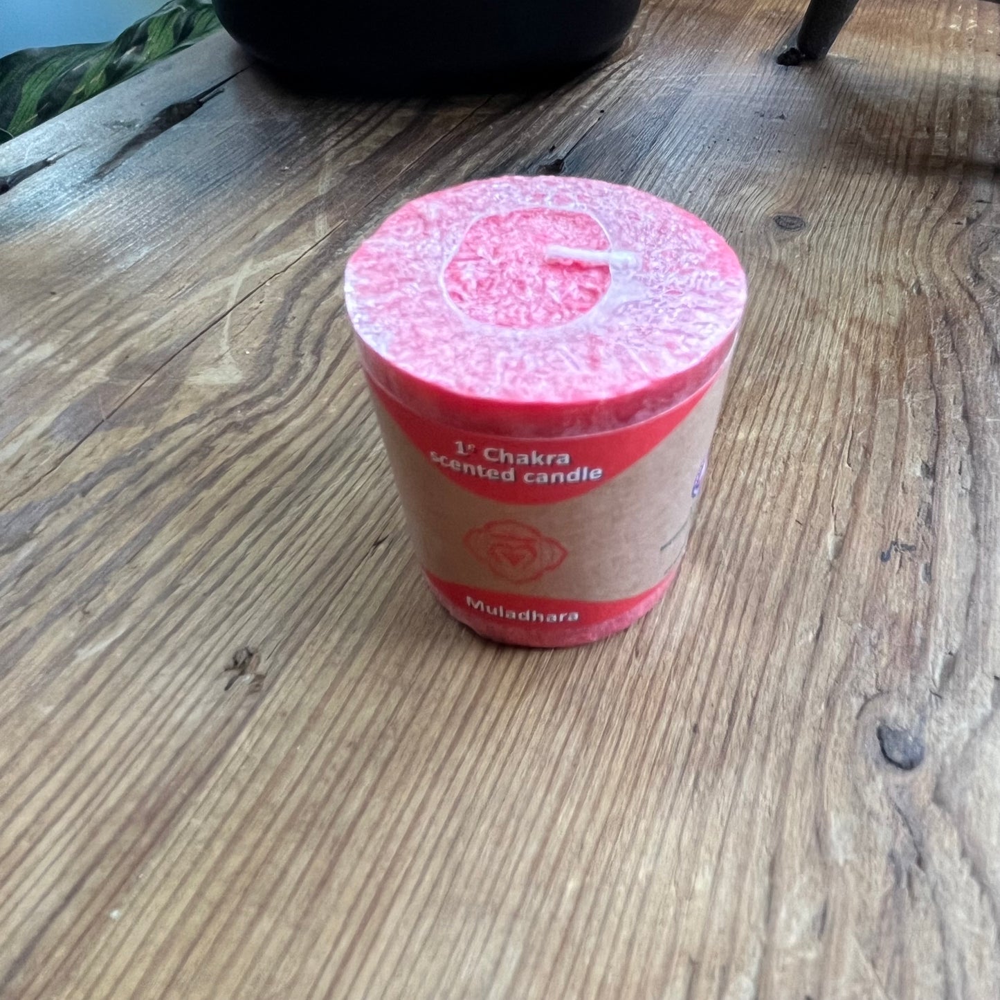 small red votive candle for root chakra