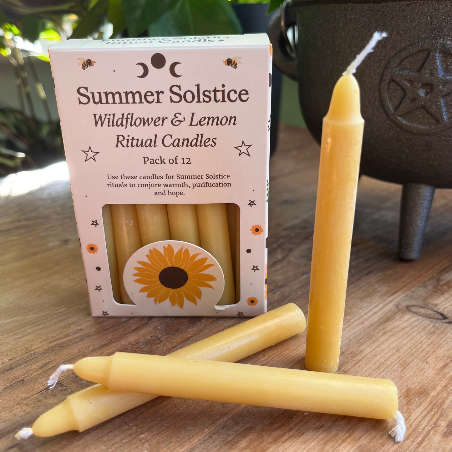 yellow ritual spell candles scented with wildflowers and lemon for the summer solstice