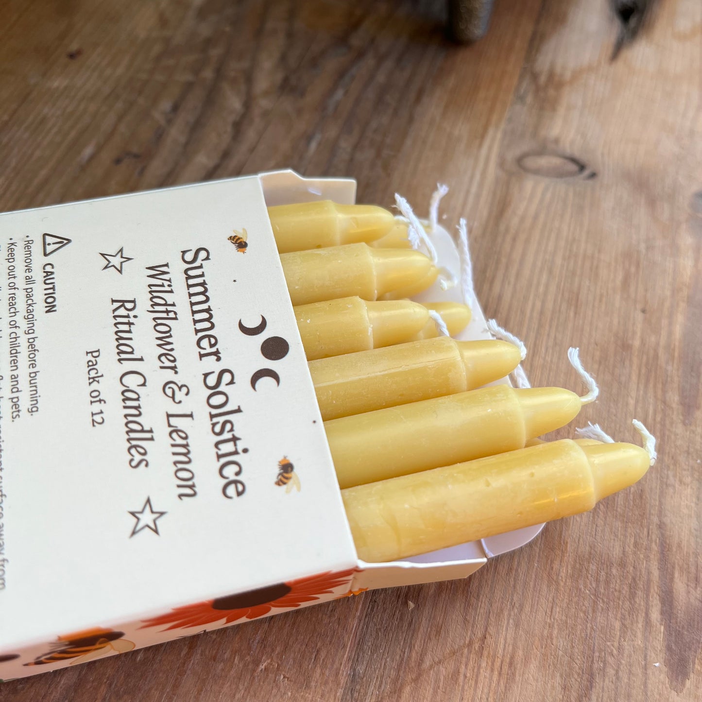 yellow ritual spell candles scented with wildflowers and lemon for the summer solstice