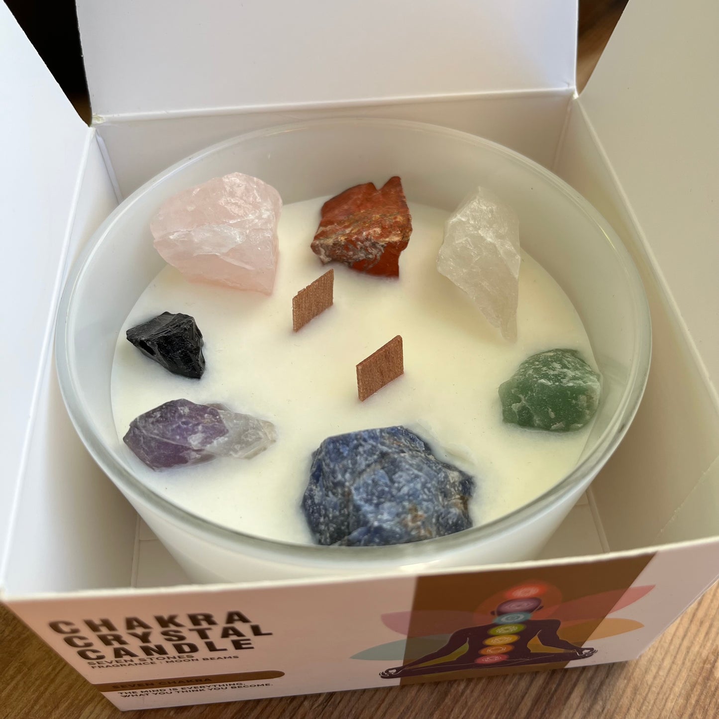 Boxed Large white candle with 7 large chunks of raw crystals to align with the 7 chakras