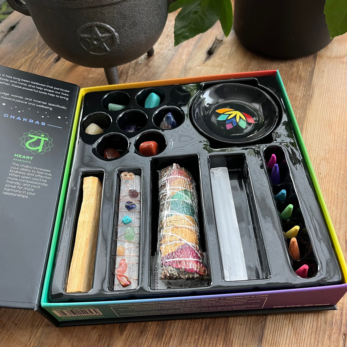 Sacred Chakra Kit 20 piece contents - tumblestones & pouch, selenite wand, copper wire gemstone wrapped selenite wand, palo santo, smudge stick, incense cones & incense plate
