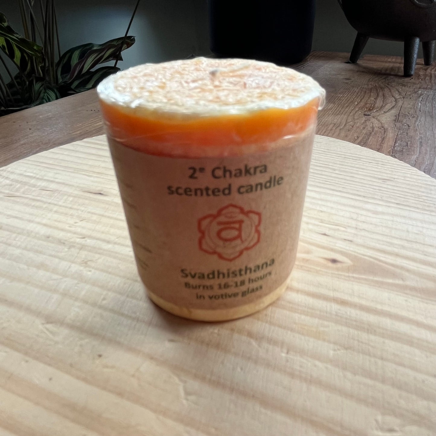 Small orange votive candle for sacral chakra