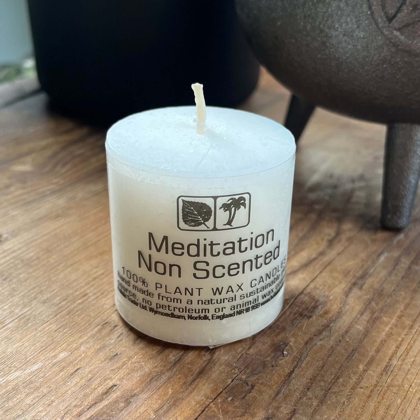 Small white votive non scented candle for meditation