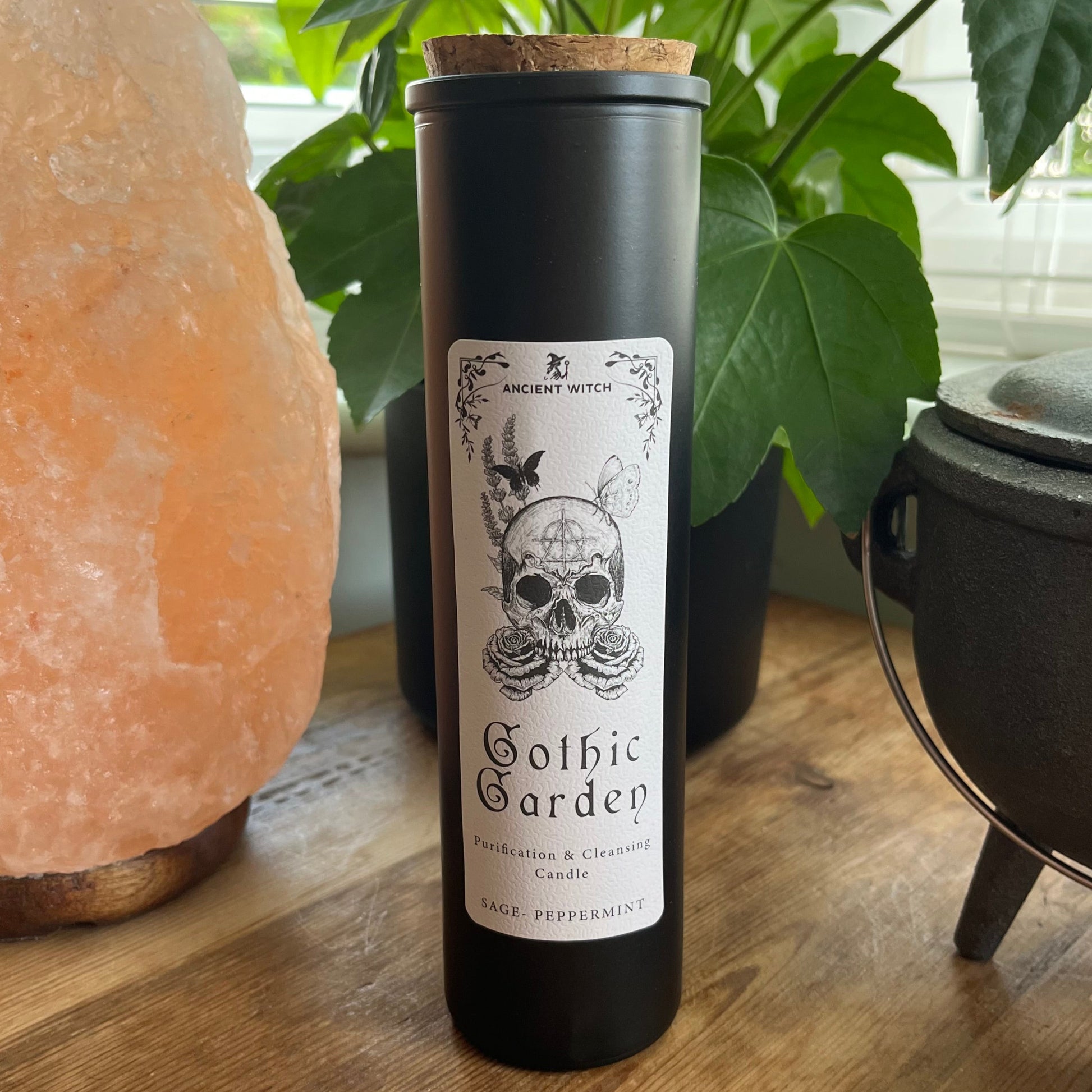 Ancient Witch Gothic Garden Candle with a beautiful illustratation. Each Glass pillar candle has a cork lid. Includes a ritual spell card. 