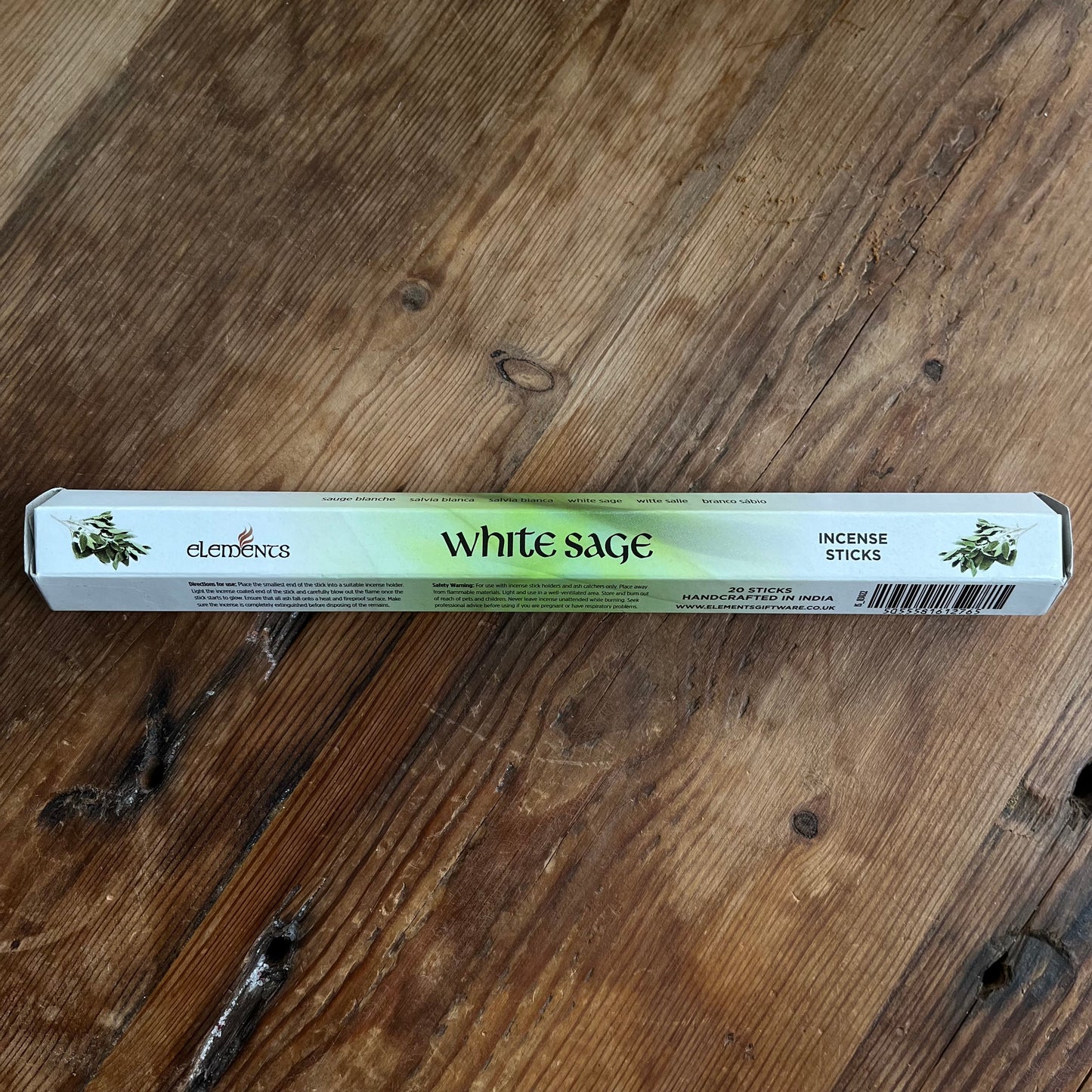 A package of White Sage incense with a green and white label.