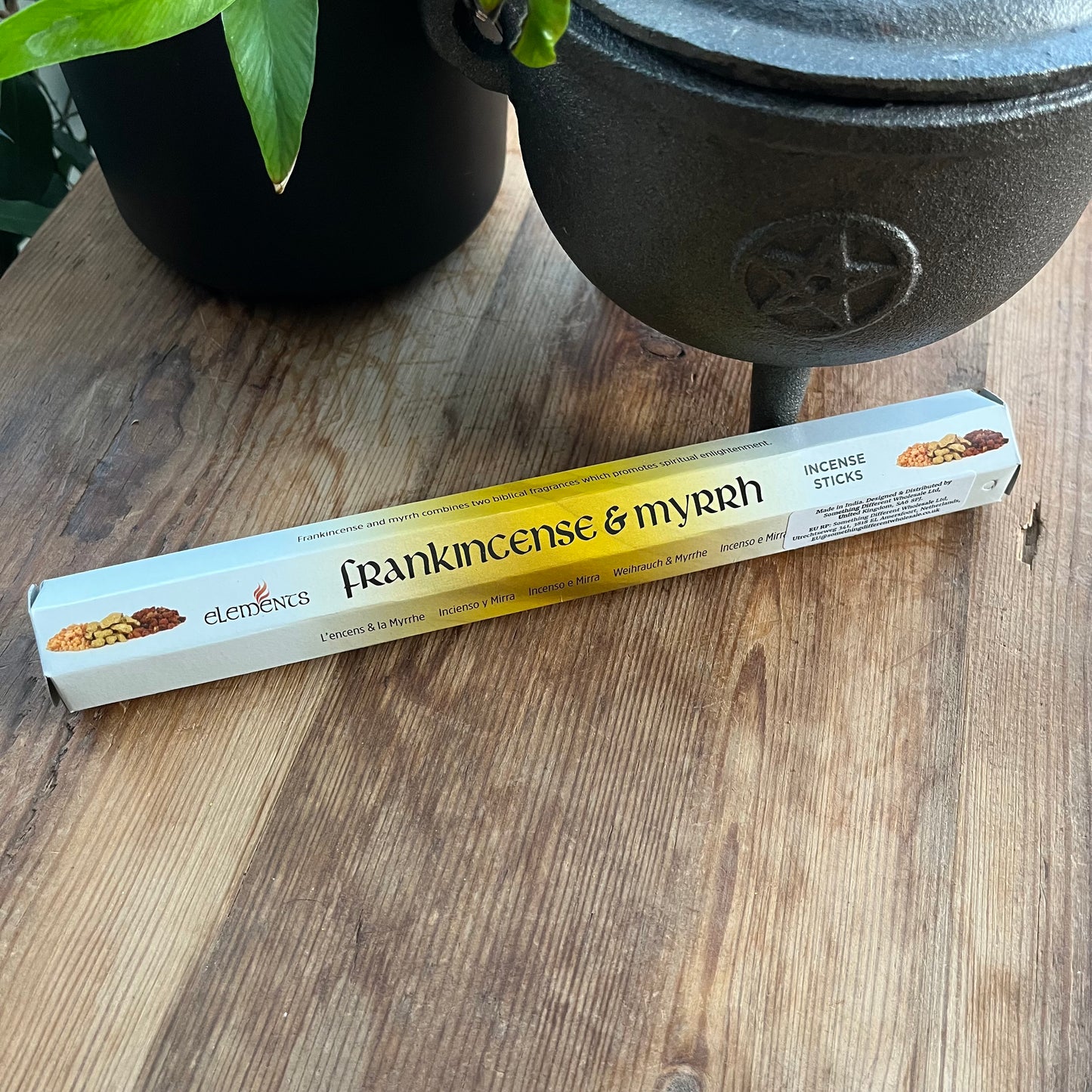 Box of Frankincense & Myrrh Incense on a wooden Background 
