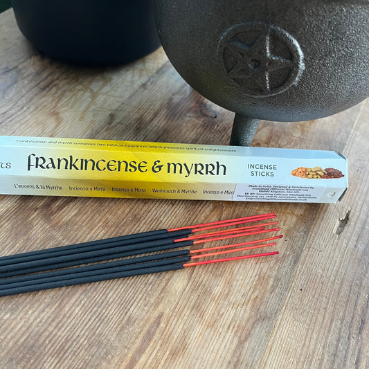 Box of Frankincense & Myrrh Incense on a wooden Background 