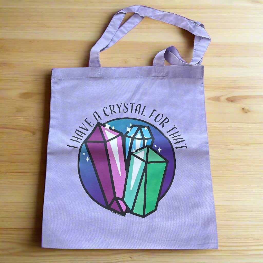 Lilac Tote Bag with a large colourful illustration  of crystals and the words 'I have a crystal for that written in black 