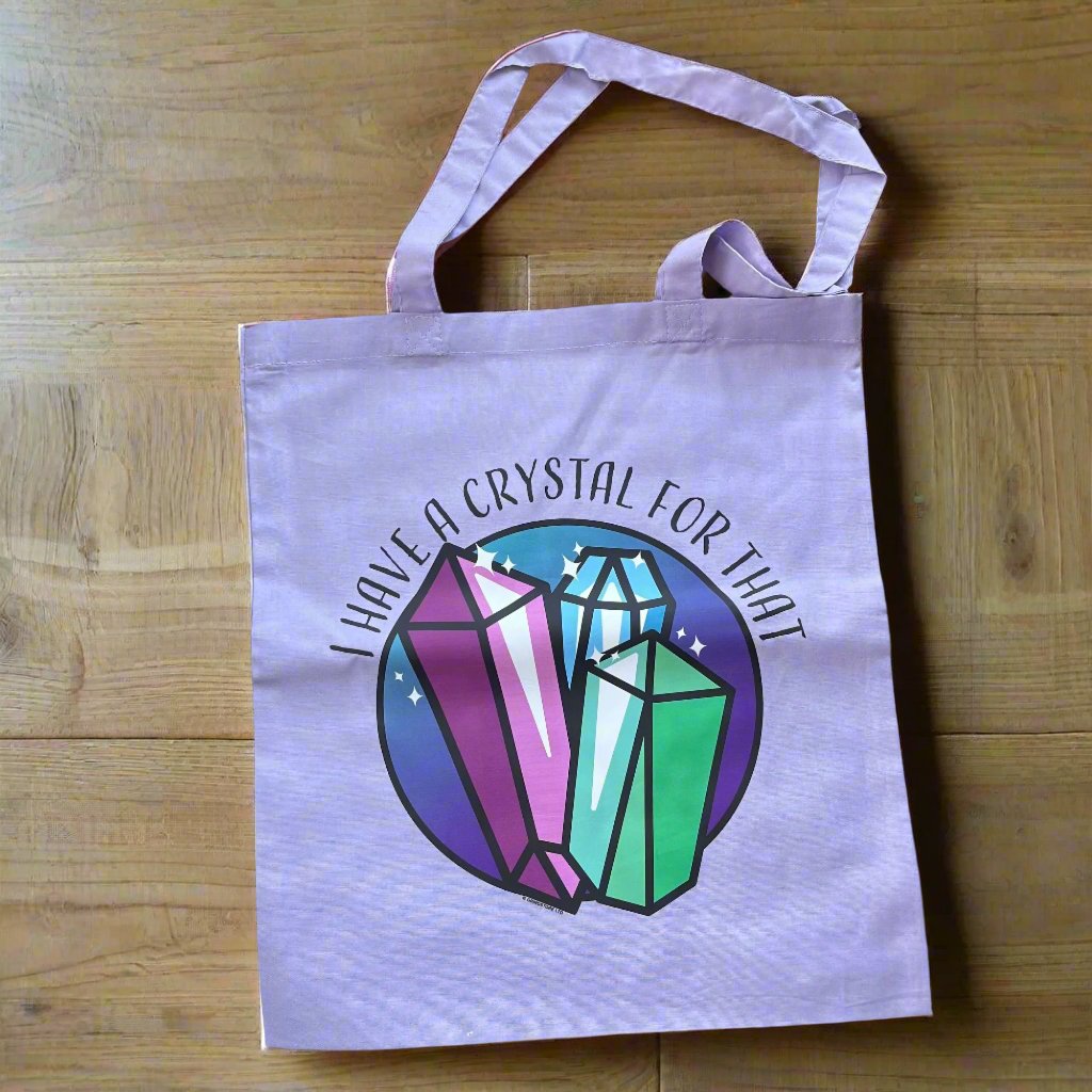 Lilac Tote Bag with a large colourful illustration  of crystals and the words 'I have a crystal for that written in black 