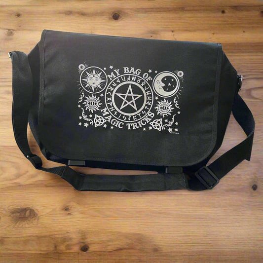 Large Messenger Bag, black canvas with magickal symbols and the words 'My bag of magic tricks' on the front. 