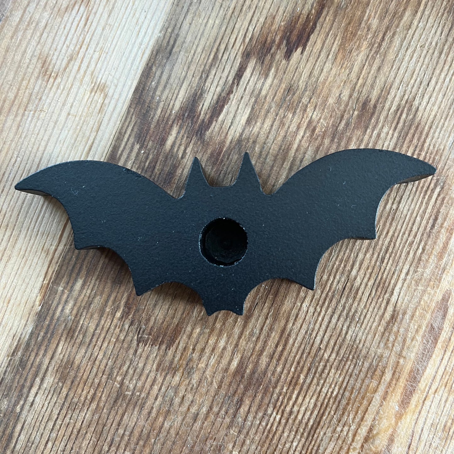 Black spell candle holder in the shape of a bat