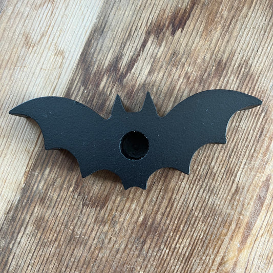 Black spell candle holder in the shape of a bat