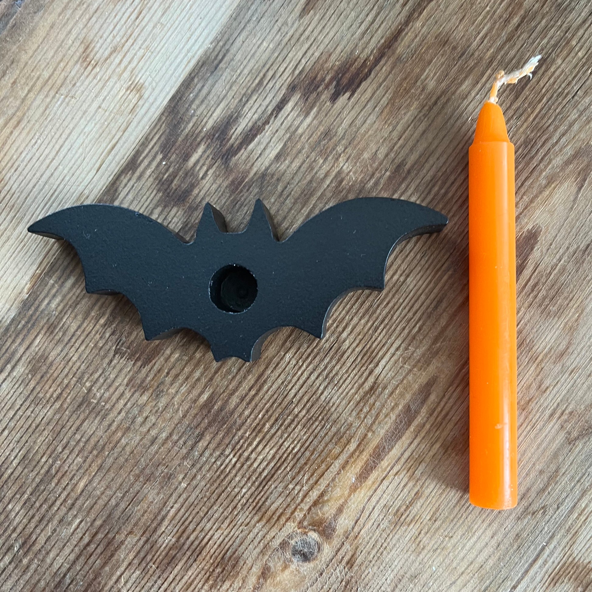 Black spell candle holder in the shape of a bat