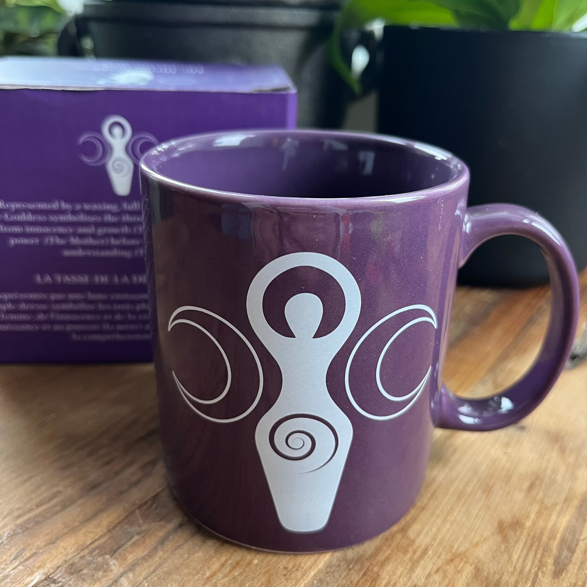 Purple bone china mug featuring a triple moon goddess design in a matching display box 