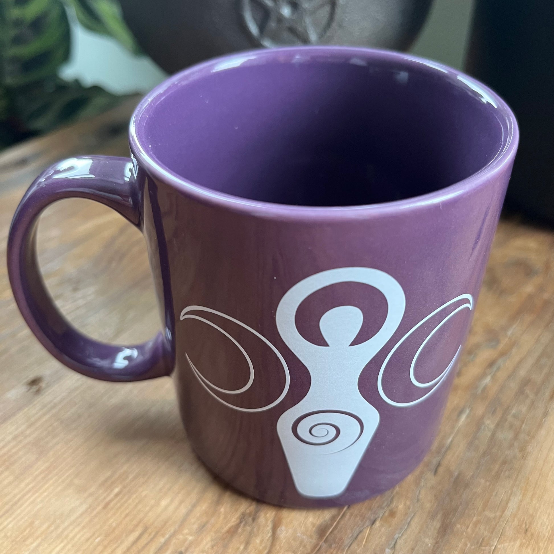 Purple bone china mug featuring a triple moon goddess on both sides