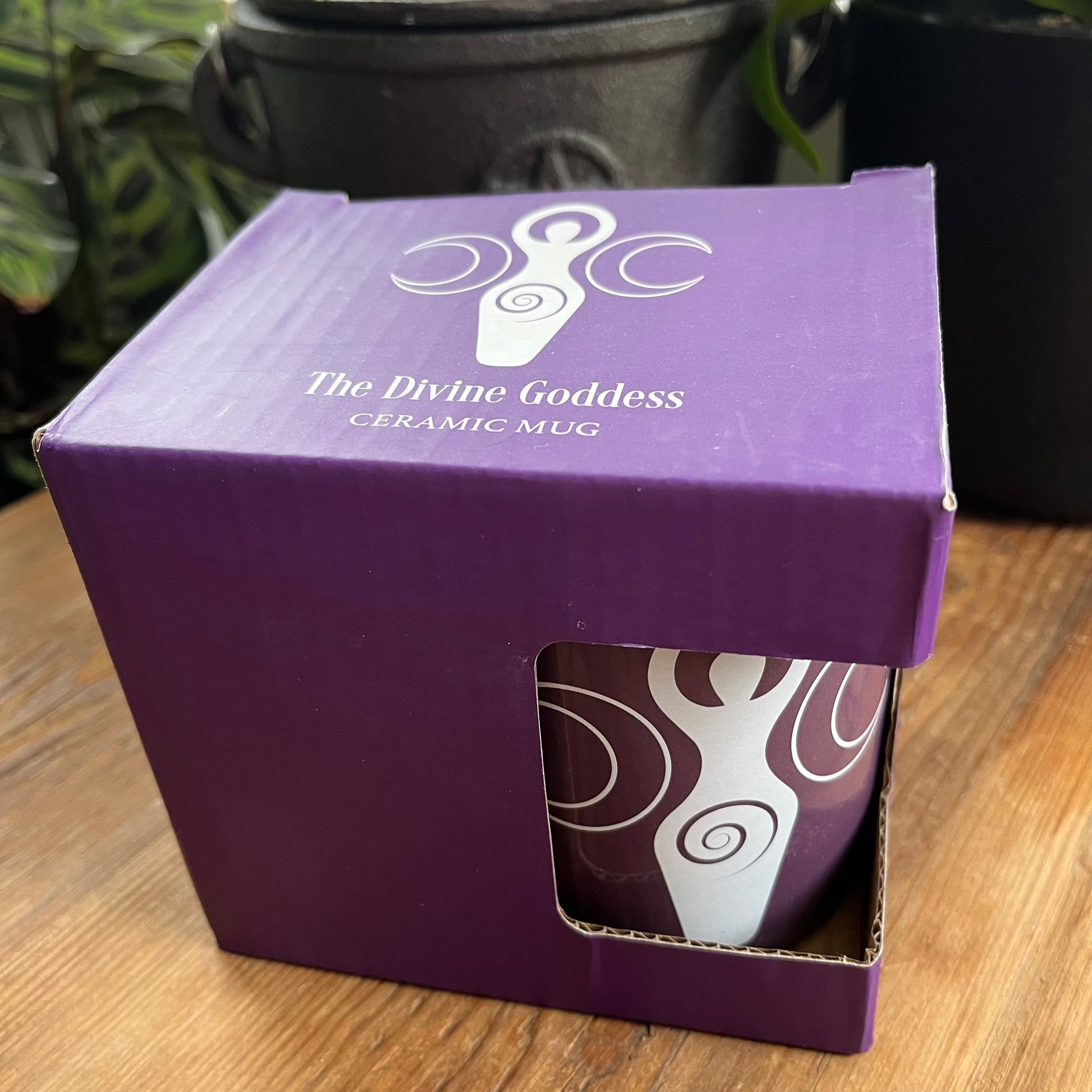 Purple bone china mug featuring a triple moon goddess design in a matching display box 