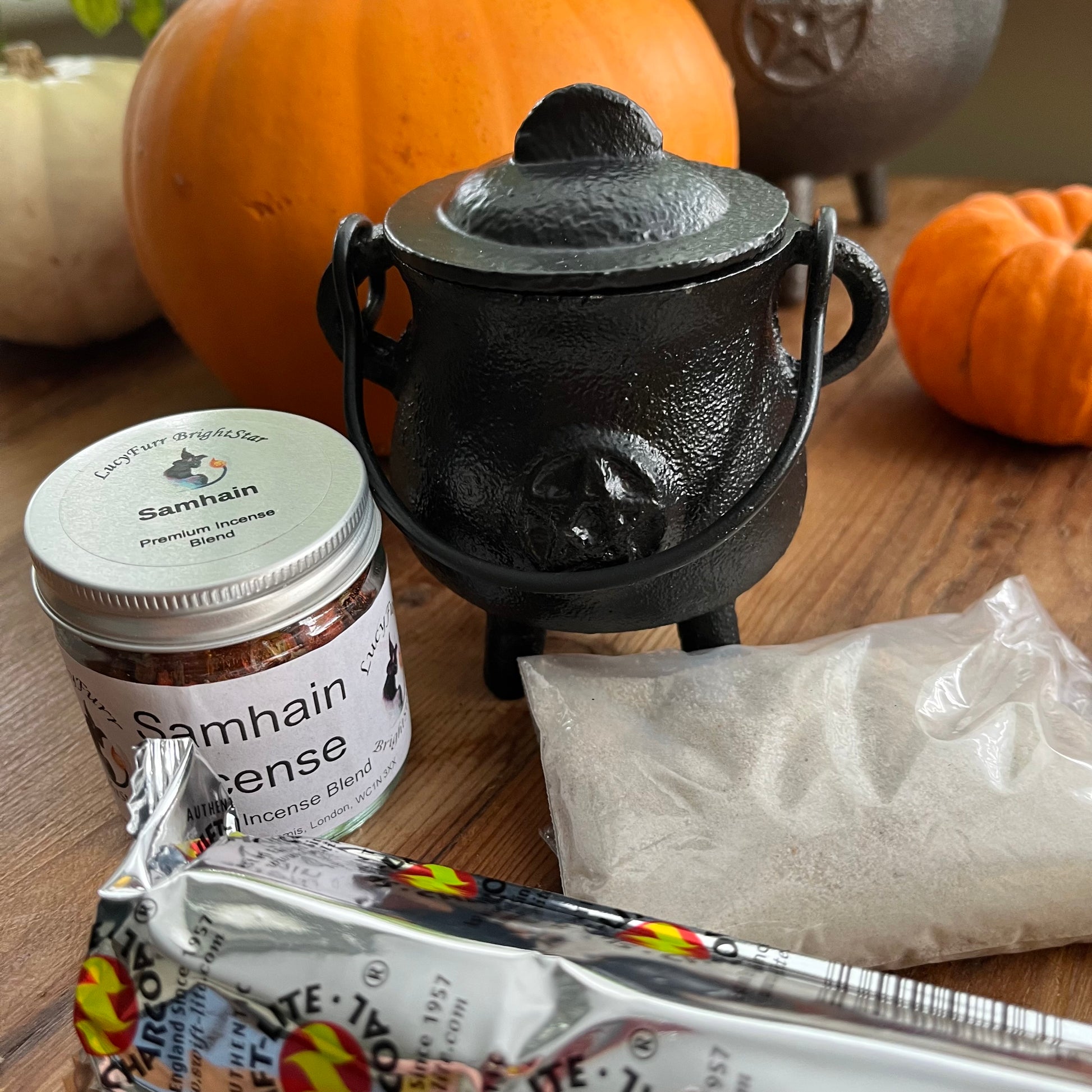 Black cauldron with Samhain incense 