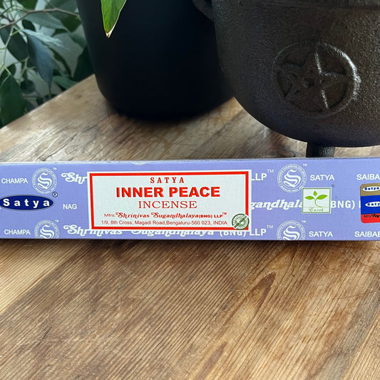 Box of Satya Inner Peace Incense on wooden background 