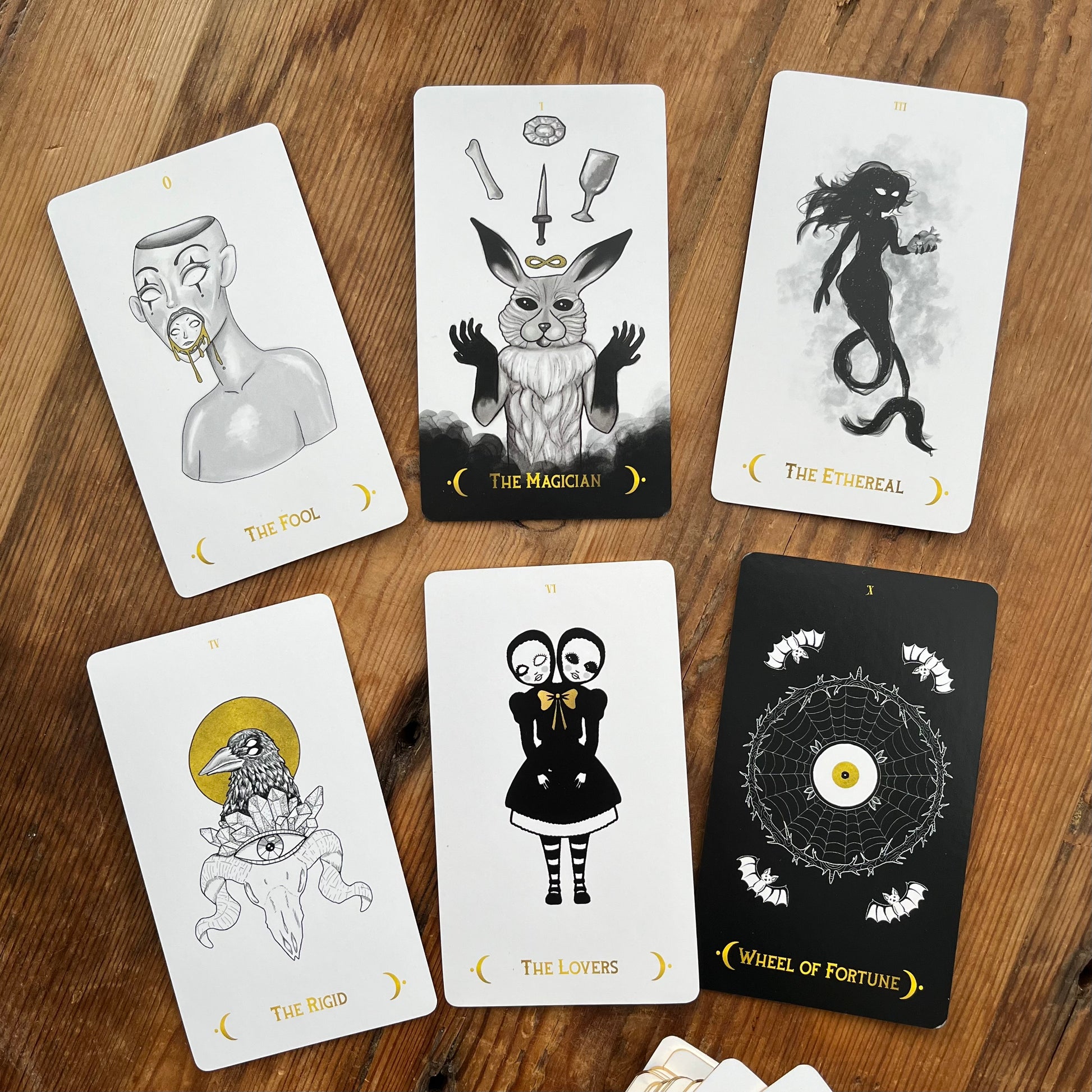 Set of tarot cards on a wooden surface