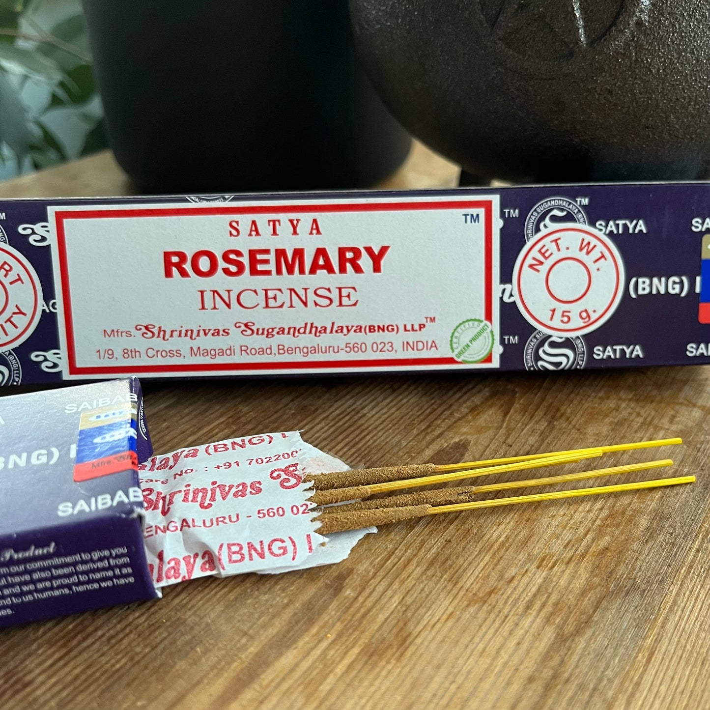 Box of Satya Rosemary incense on a wooden surface