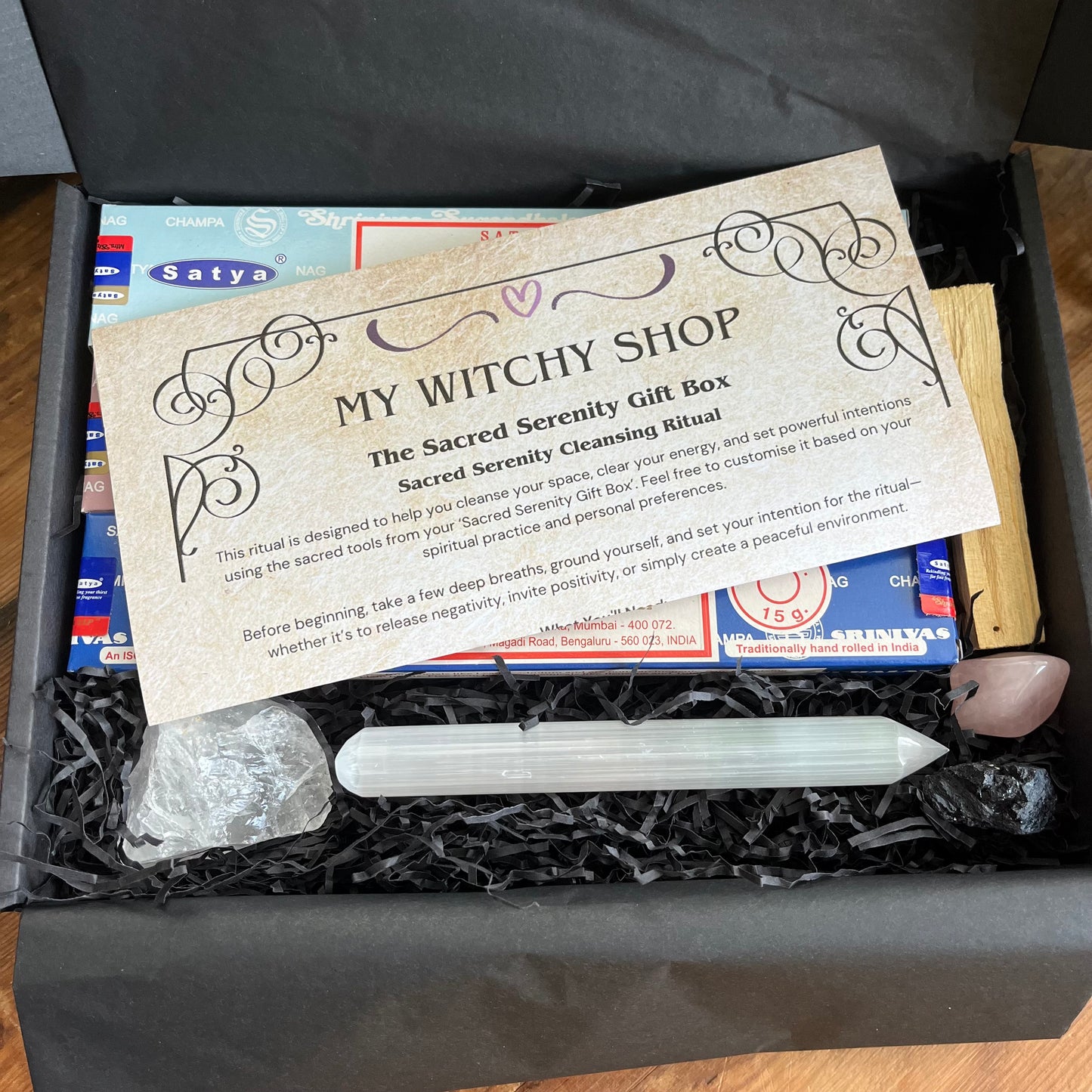 My Witchy Shop Sacred Serenity Gift Box with crystal and card on black background