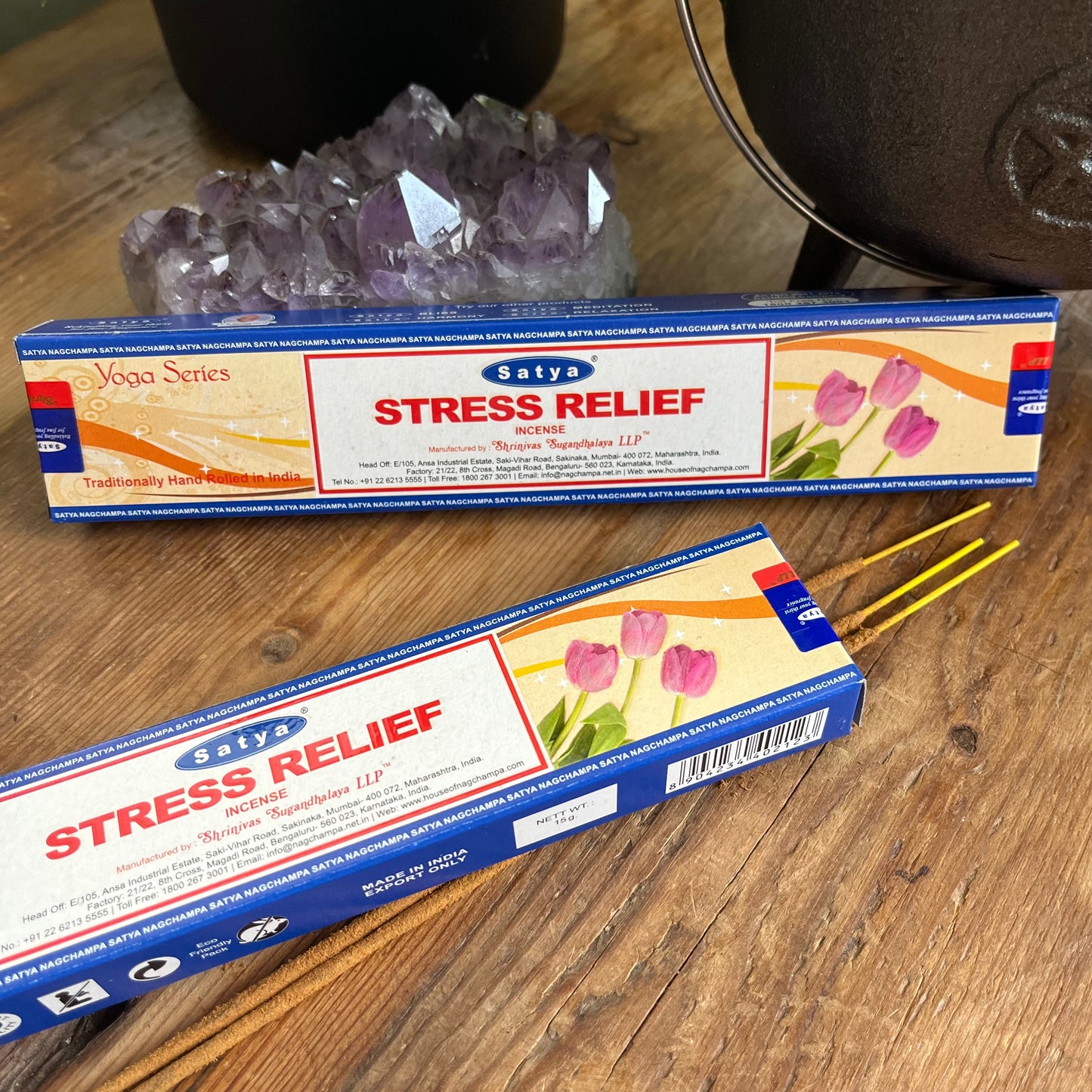 Two boxes of Satya Stress relief incense one box is open with some incense sticks peeking out