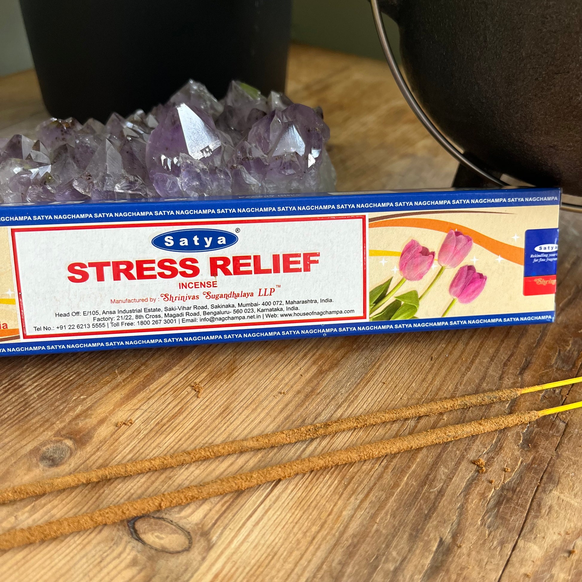 Box of Satya stress relief incense with some loose incense sticks 