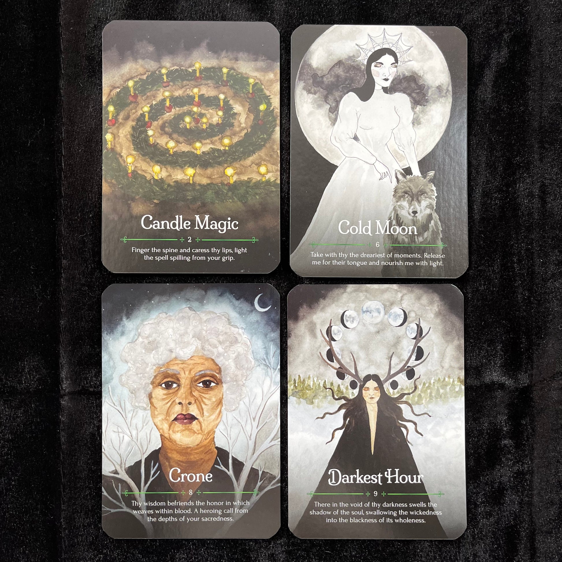 Four tarot cards with illustrations and text on a dark background