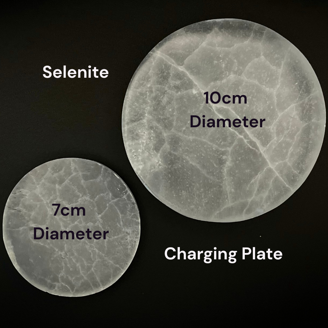 Two round selenite crystal spheres on a black background, one labeled 7cm diameter and the other 10cm diameter, with text identifying them as Selenite and Charging Plate.