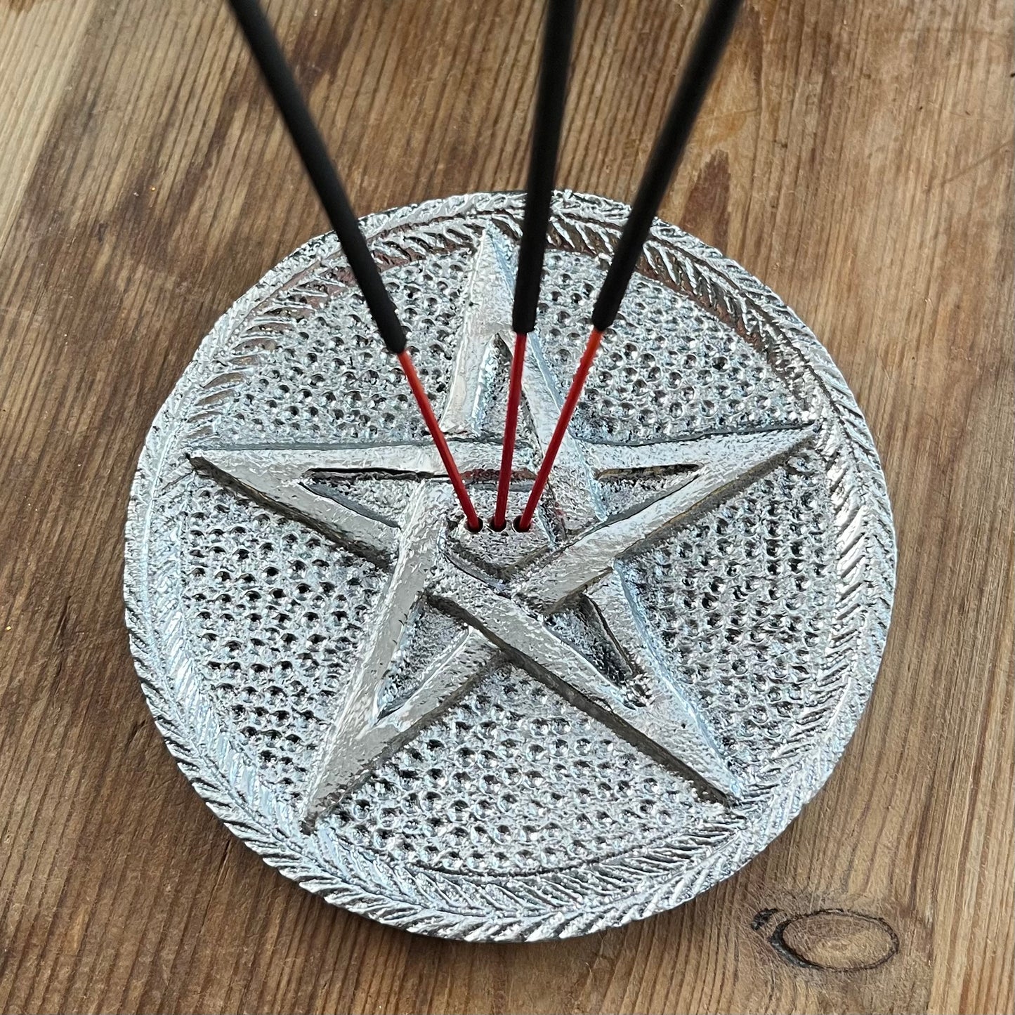 Silver plate for holding multiple incense sticks with pentagram design 