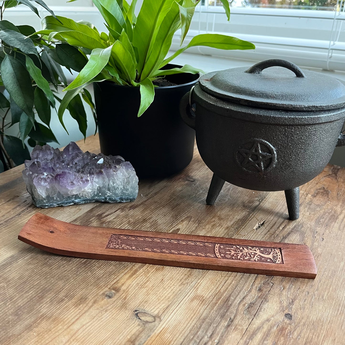 Traditional ski shaped wooden Incense Stick Holder with a tree engraved into the wood 