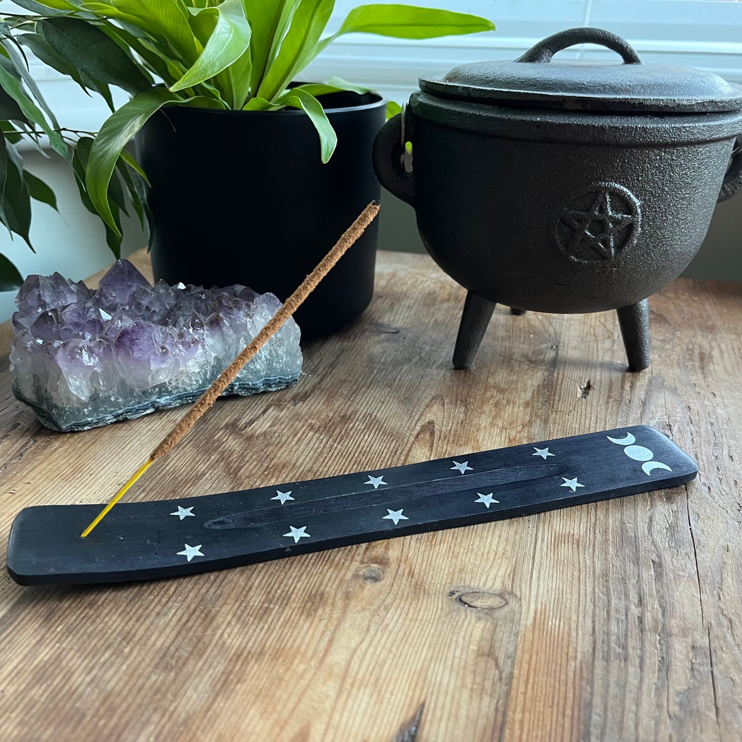 Triple moon wooden incense ash catcher (Black) features a printed triple moon design accented by silver stars.