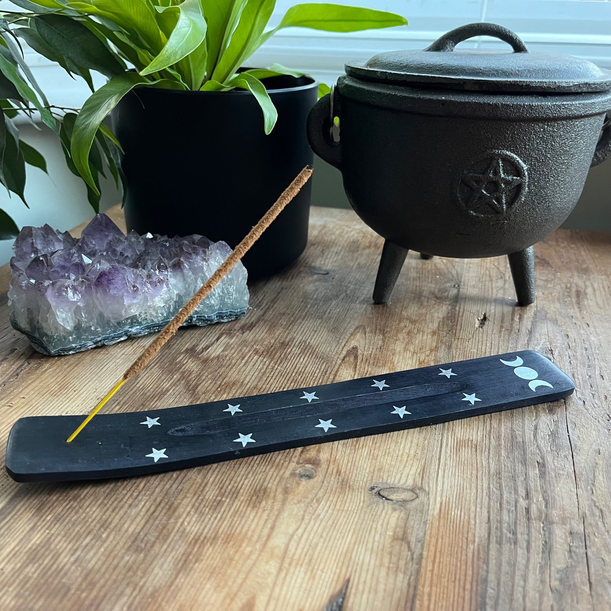Triple moon wooden incense ash catcher (Black) features a printed triple moon design accented by silver stars.