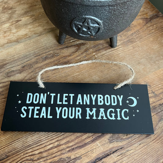 "Don’t let anybody steal your magic" wall sign