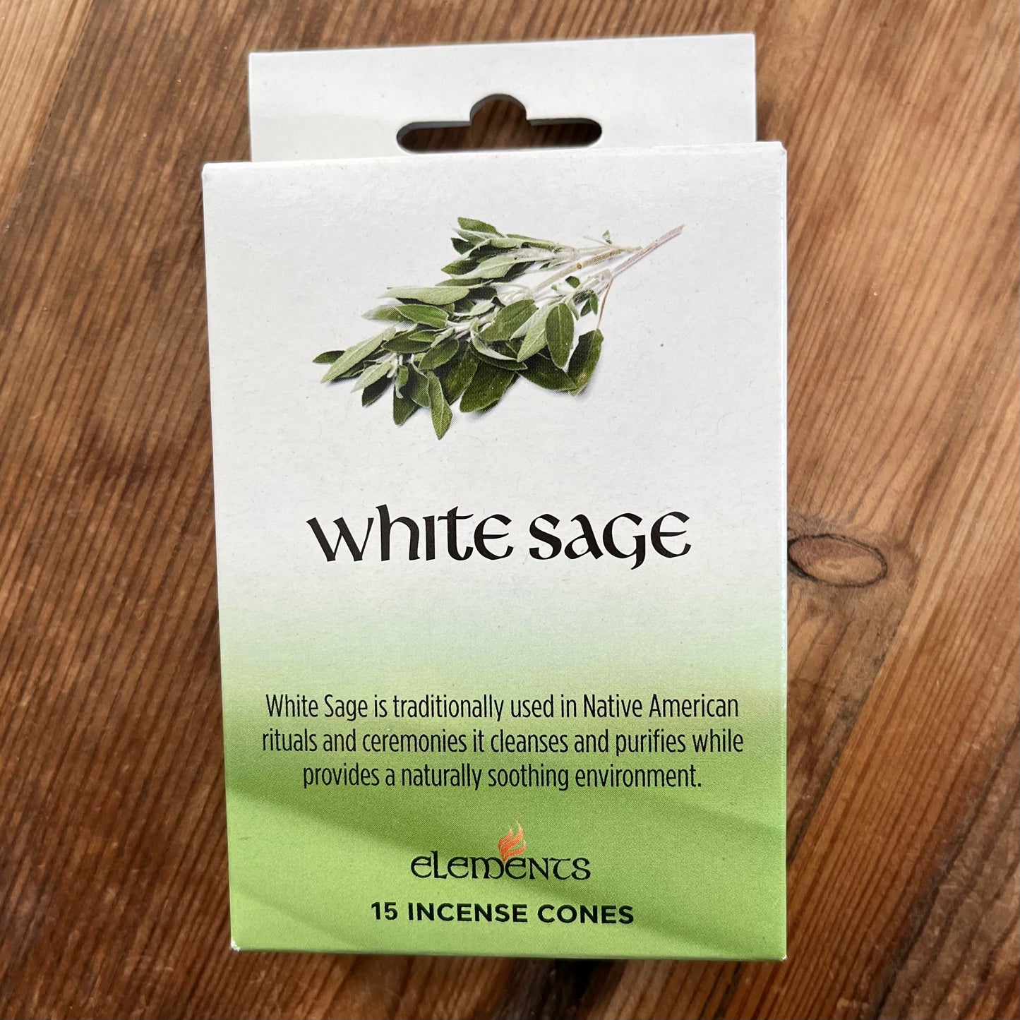 Box of White Sage Incense Cones on a wooden surface