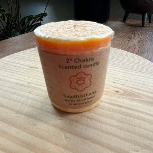 Small orange votive candle for sacral chakra 