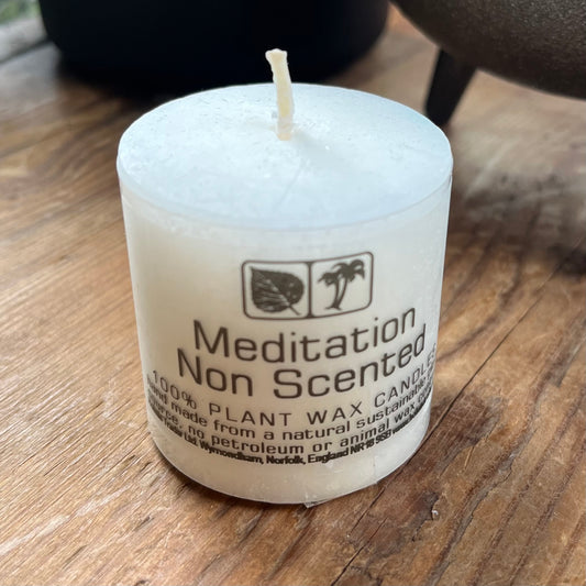 Small white votive non scented candle for meditation
